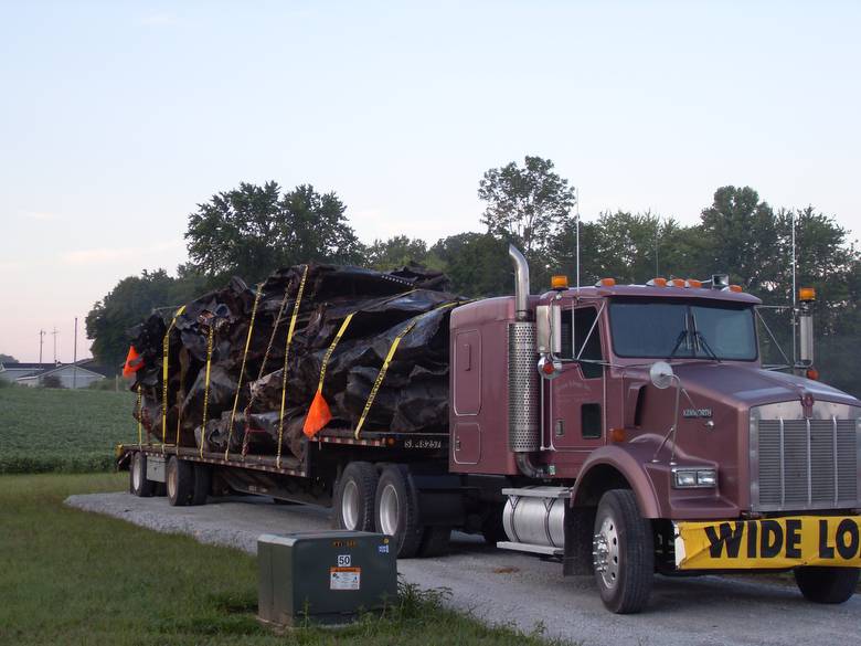 Harvestore Silos being Hauled in for Scrap